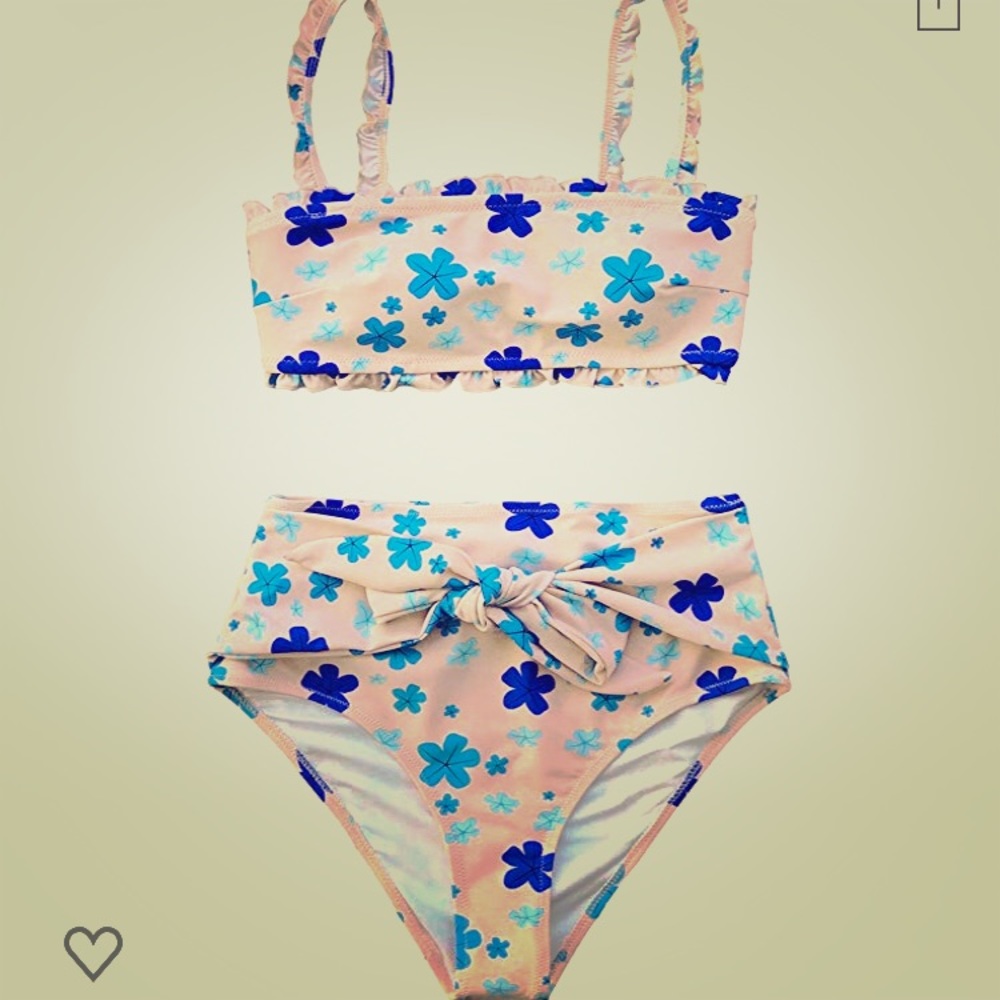High waisted. Super cute. Never worn swimsuit